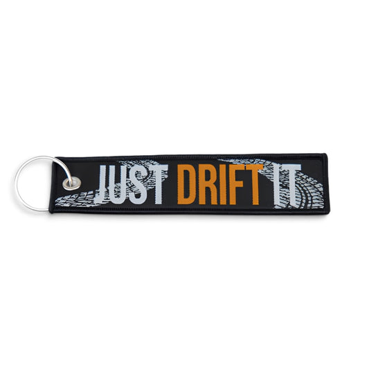 Sleutelhanger - Flight Tag - Met opschrift “Just Drift It” | Zwart